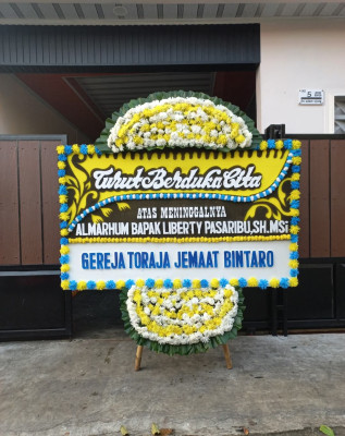 Papan Bunga Duka di Upai